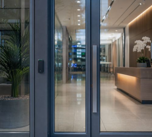 Access control reader installed at a commercial office entrance in Southwark